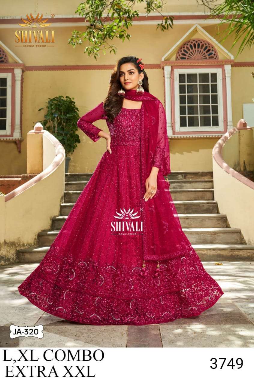 a scarlet red gown in embellished in gold stone embroider KALKI Fashion  India